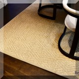 DR01. Sisal rug. Measures approx. 14'6” x 9'6” 